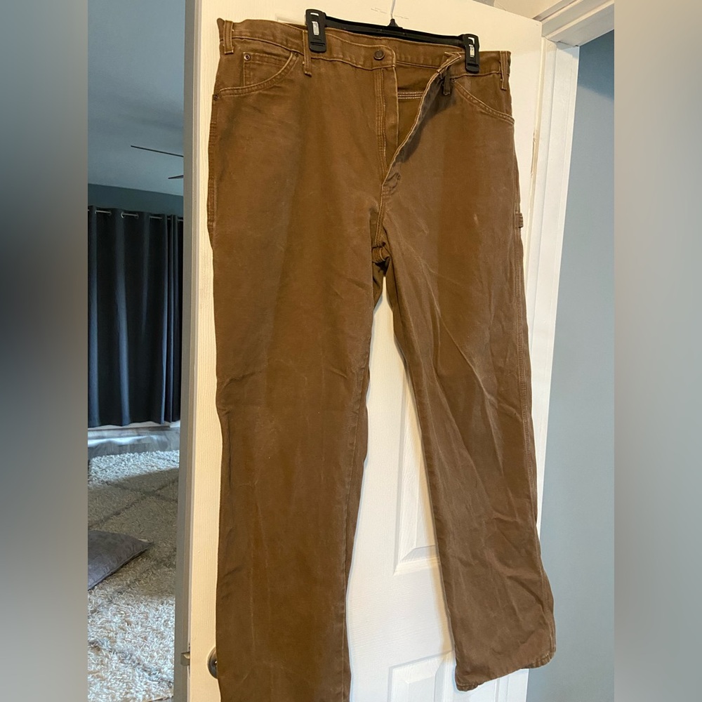 Men-Dickies khaki pants. Size 38x32, small mark shown in picture